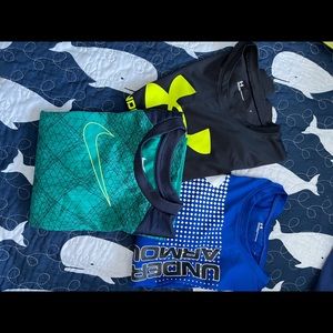 One Nike and 2 Under Armour long sleeve shirts